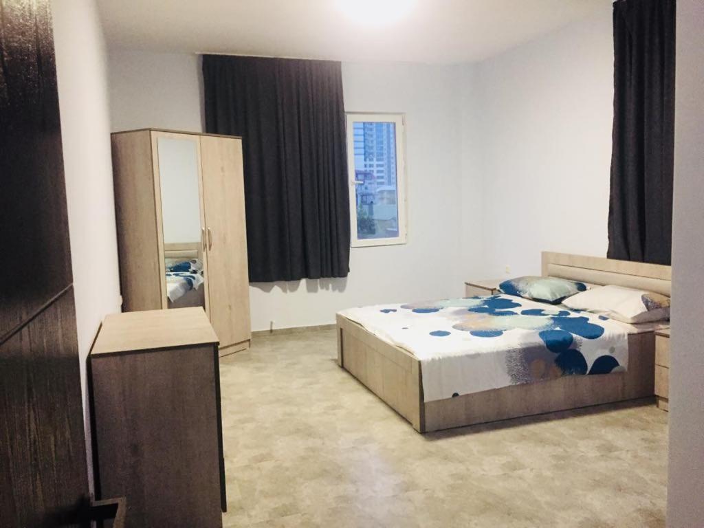 Postel nebo postele na pokoji v ubytování Batumi Hotel