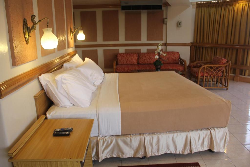 Postel nebo postele na pokoji v ubytování Elegant Circle Inn