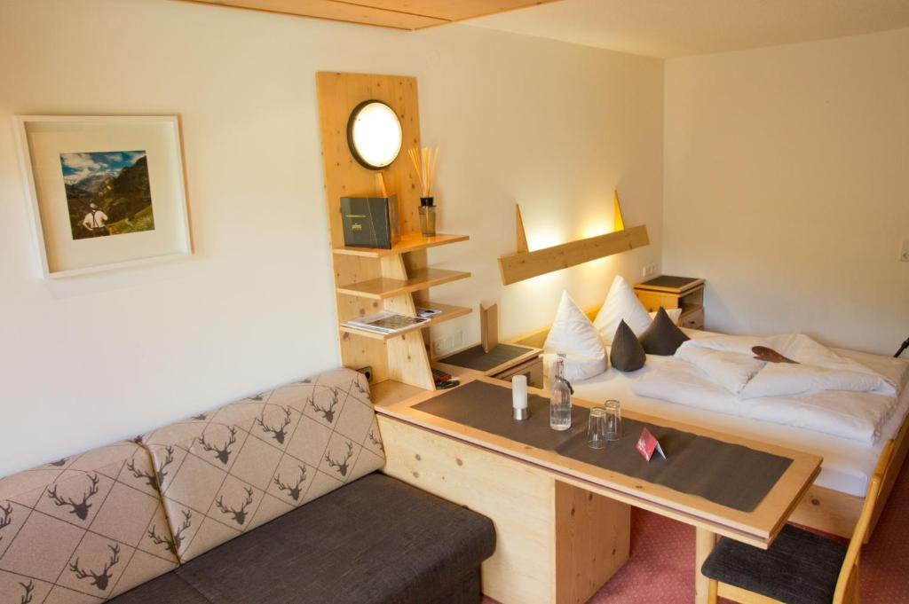 Postel nebo postele na pokoji v ubytování Hotel Garni Hainbacherhof