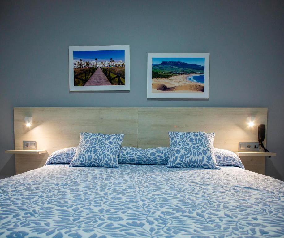Posteľ alebo postele v izbe v ubytovaní Hotel Bari