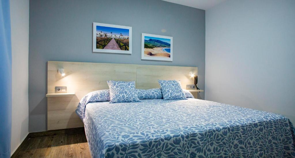 Posteľ alebo postele v izbe v ubytovaní Hotel Bari