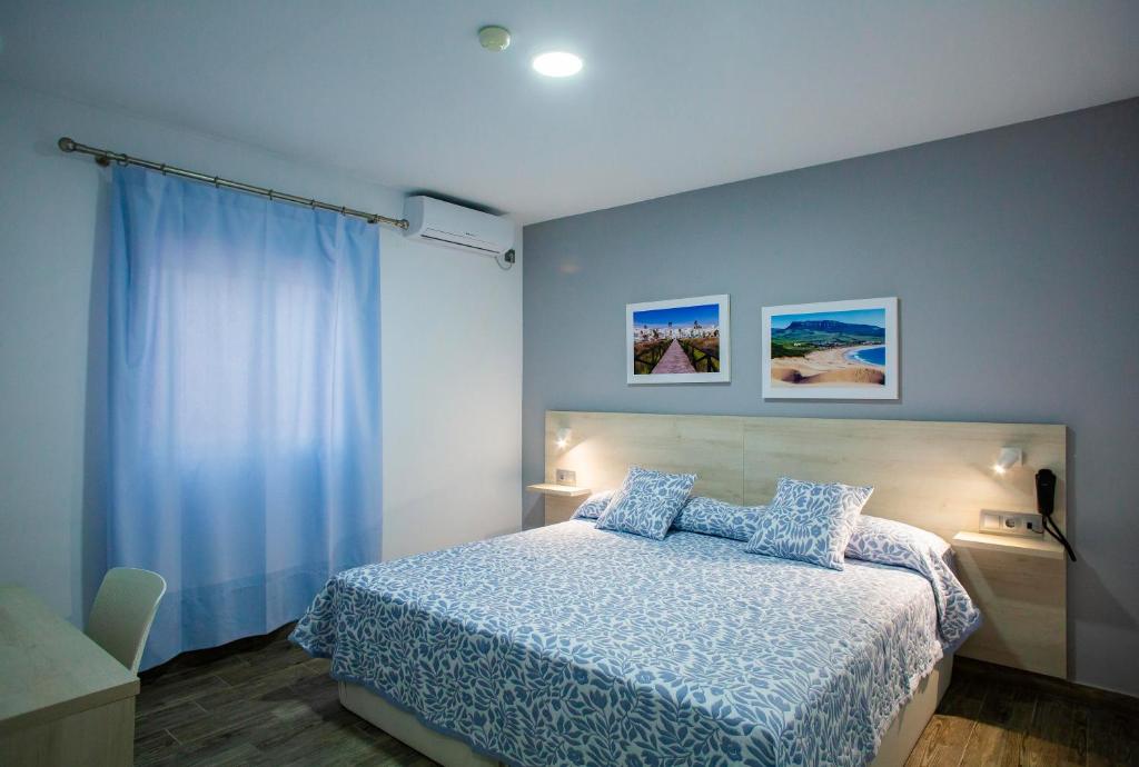 Posteľ alebo postele v izbe v ubytovaní Hotel Bari
