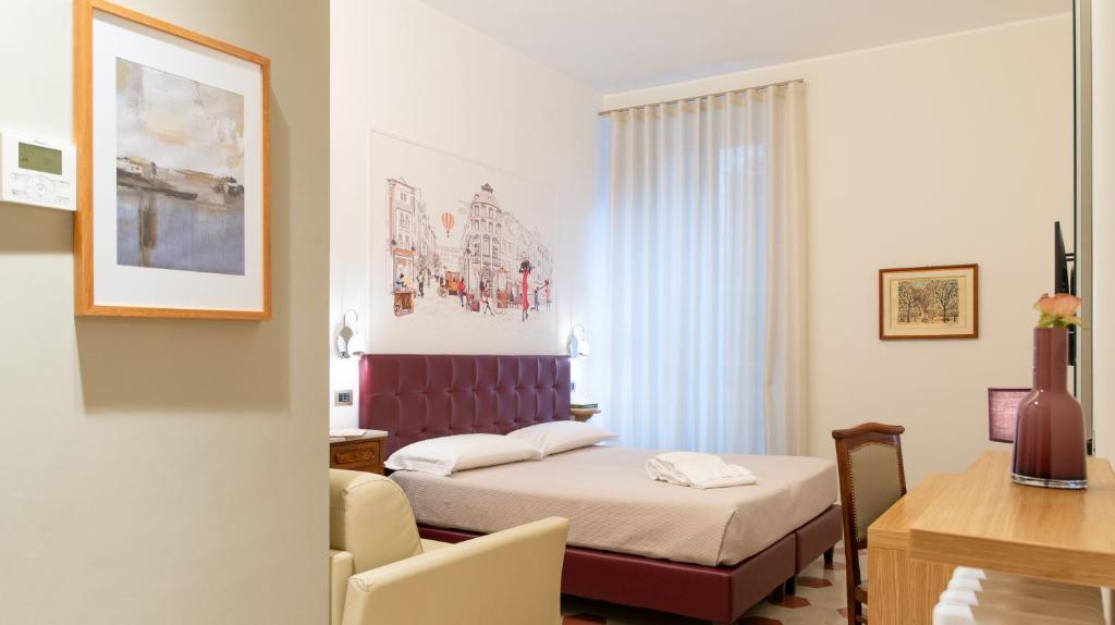Postel nebo postele na pokoji v ubytování Portica10 Assisi