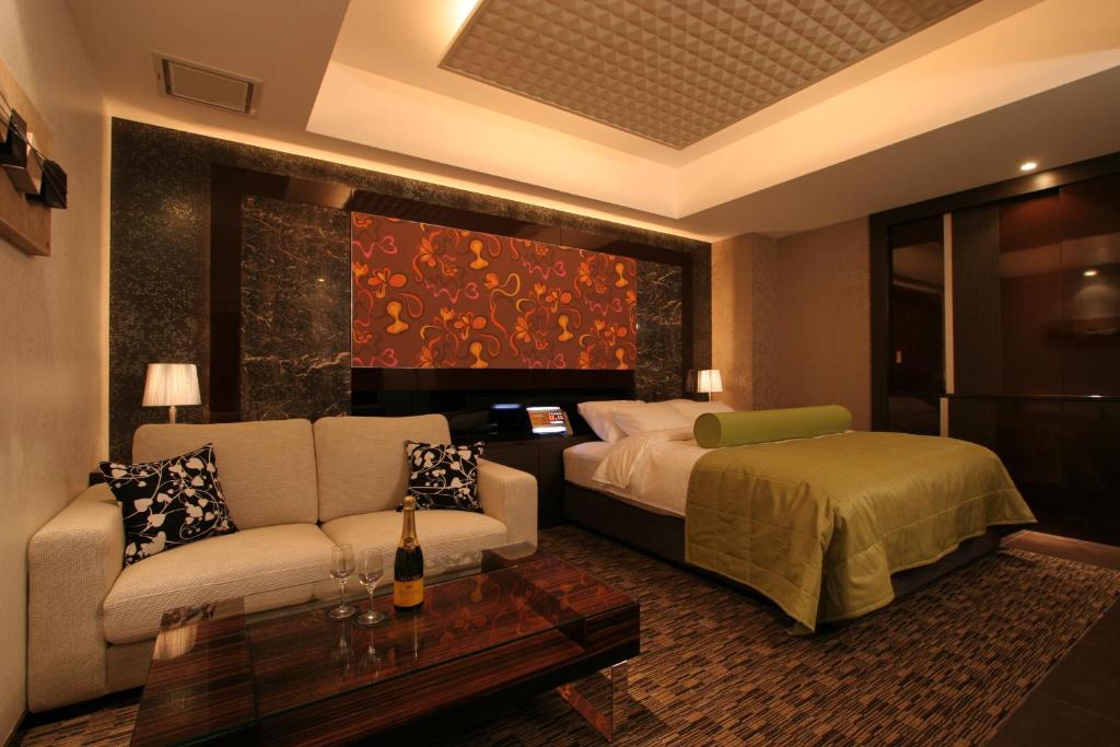 Postel nebo postele na pokoji v ubytování HOTEL W-PREMIUM -W GROUP HOTELS and RESORTS-