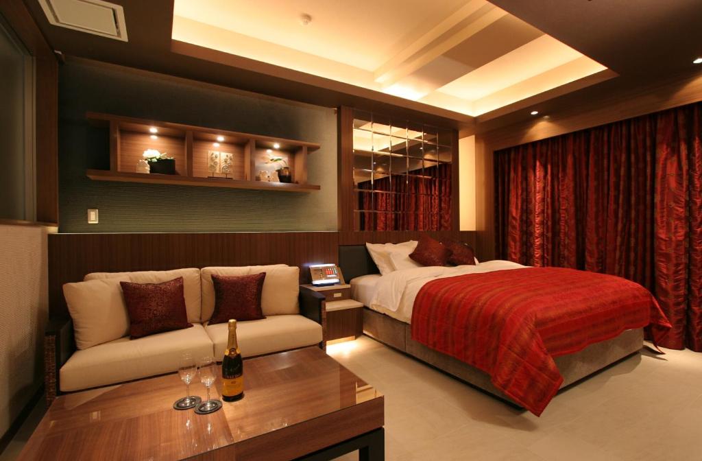 Postel nebo postele na pokoji v ubytování HOTEL W-PREMIUM -W GROUP HOTELS and RESORTS-