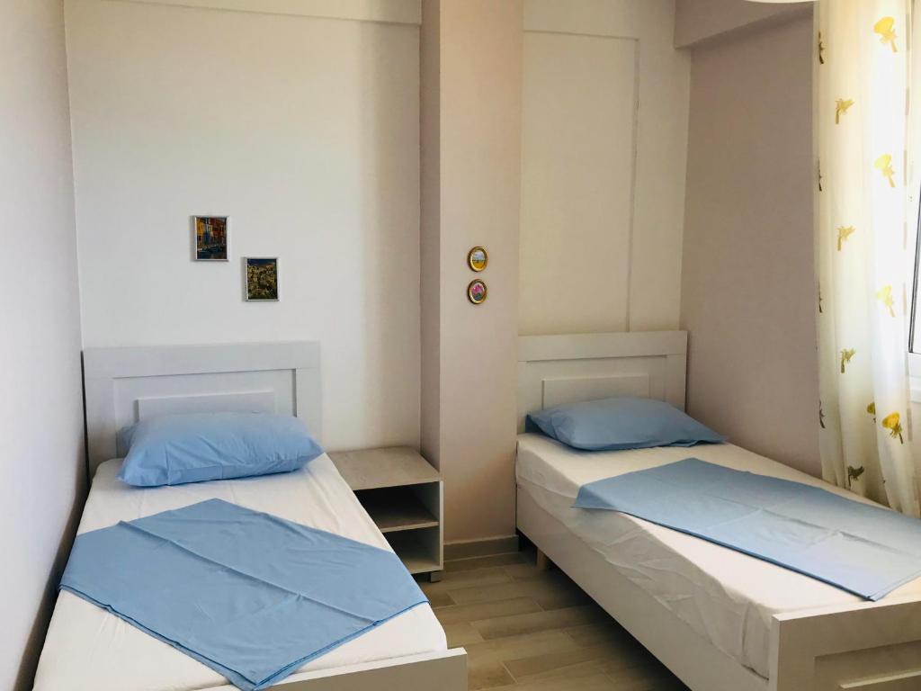 Postel nebo postele na pokoji v ubytování Vila Milo