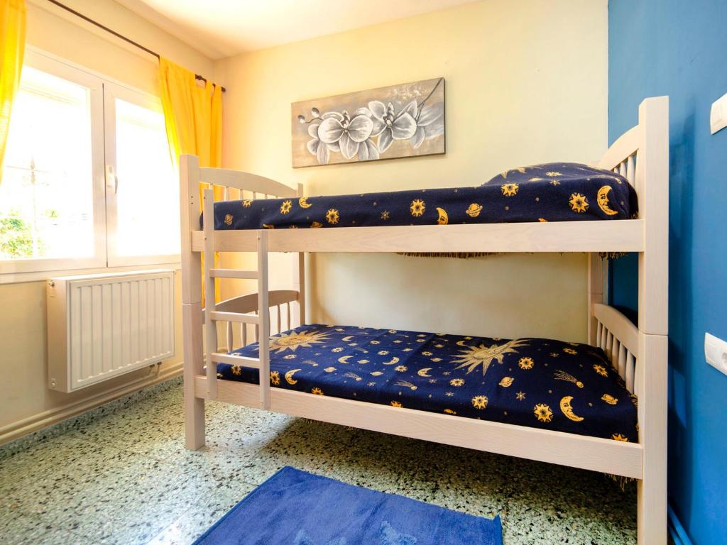Posteľ alebo postele v izbe v ubytovaní Holiday Home Alma by Interhome