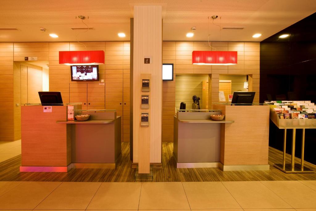 Telewizja i/lub zestaw kina domowego w obiekcie Ibis Wien Messe