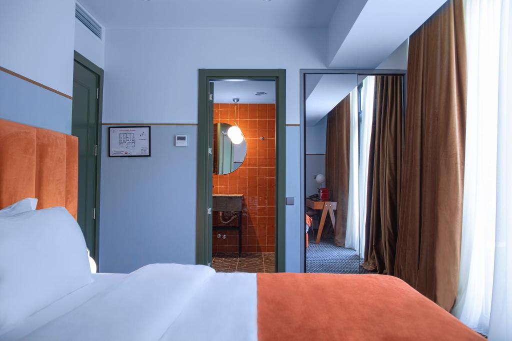 Postel nebo postele na pokoji v ubytování Zemeli Boutique Hotel by DNT Group