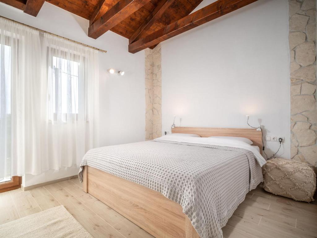 Postel nebo postele na pokoji v ubytování Holiday Home Marko by Interhome