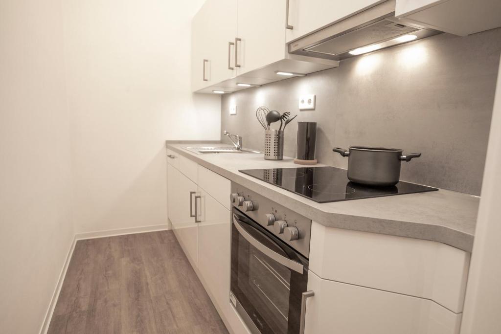 Kuchyň nebo kuchyňský kout v ubytování Boardinghouse Flensburg - by Zimmer FREI! Holidays