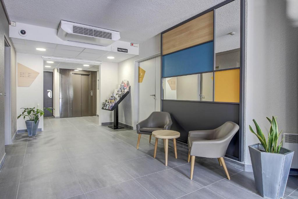 Posezení v ubytování B&B HOTEL BEAUNE Nord