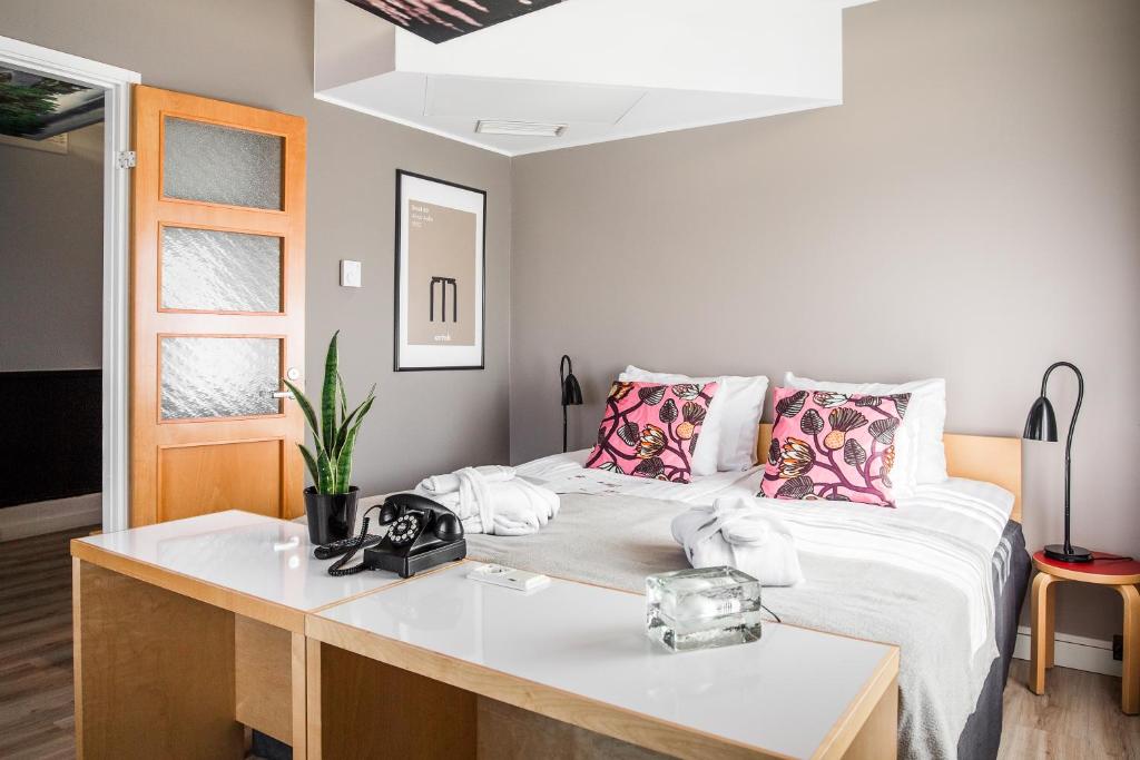 Postel nebo postele na pokoji v ubytování Hotel Helka