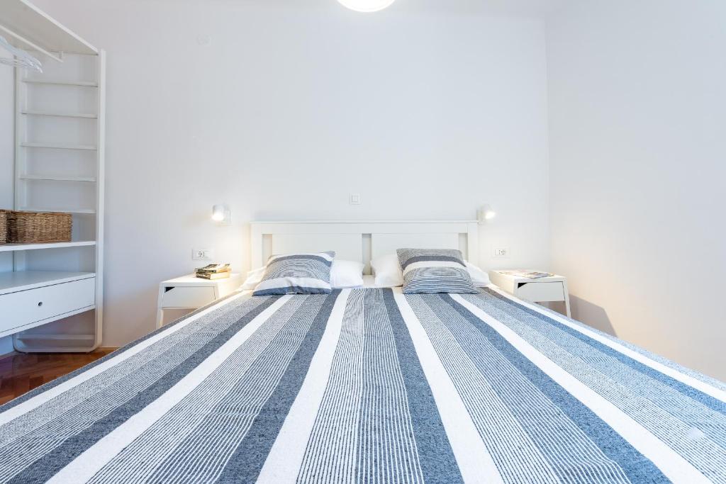 Posteľ alebo postele v izbe v ubytovaní Apartments Simović Old Town