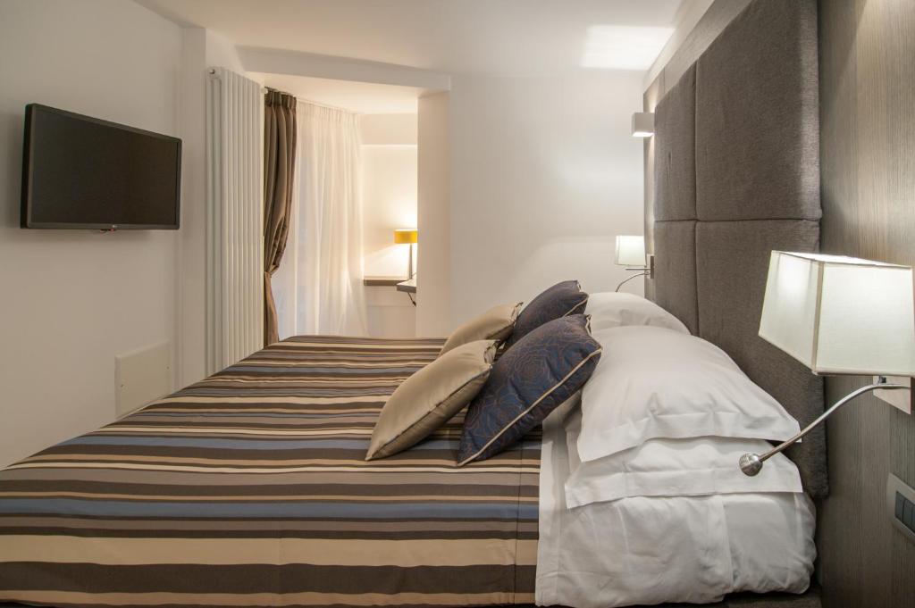 Posteľ alebo postele v izbe v ubytovaní Wellness Home Rome