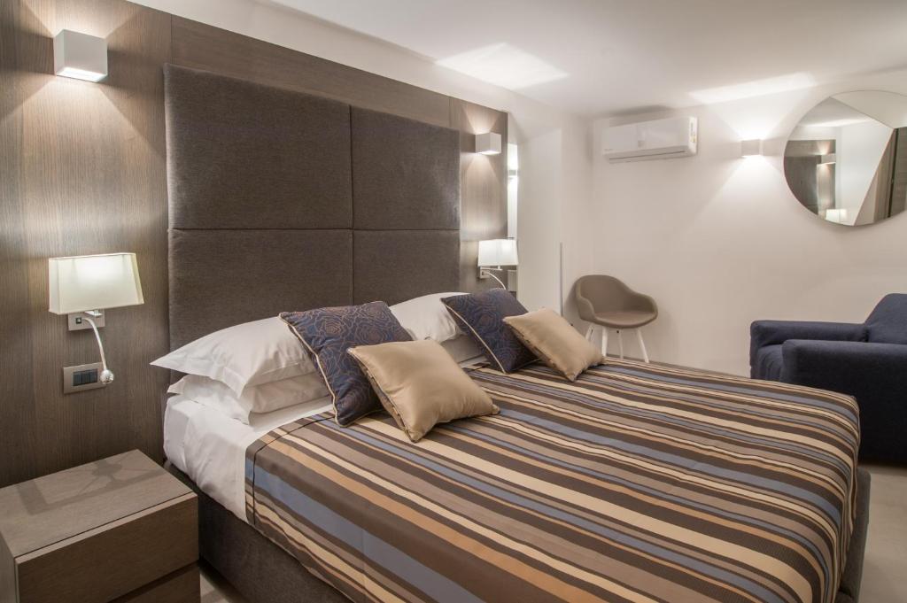 Posteľ alebo postele v izbe v ubytovaní Wellness Home Rome