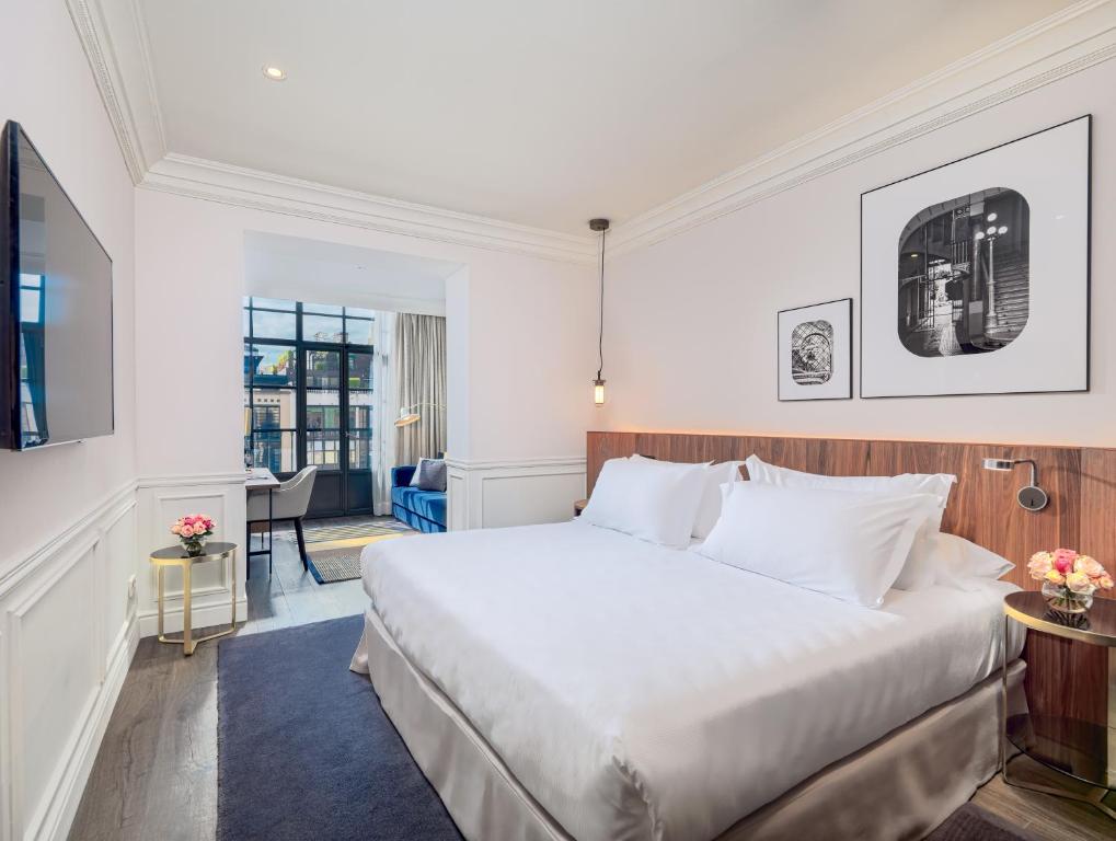 Postel nebo postele na pokoji v ubytování H10 Casa Mimosa 4* Sup