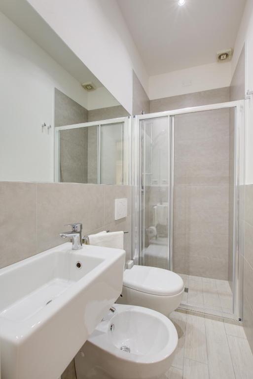 Koupelna v ubytování Hotel Olympia