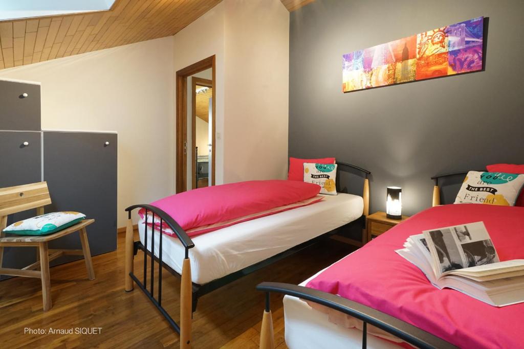 Postel nebo postele na pokoji v ubytování Gîte les gadlis