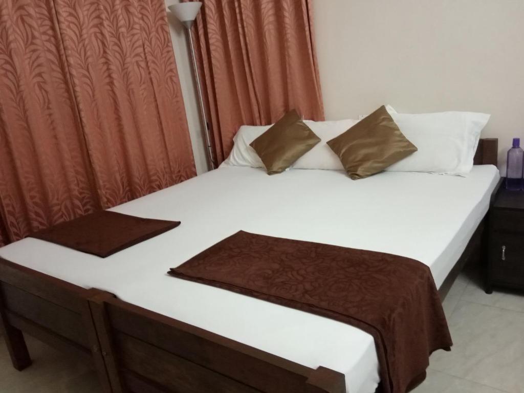 Postel nebo postele na pokoji v ubytování Ocean Stay