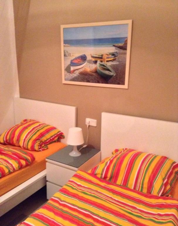 Postel nebo postele na pokoji v ubytování Hartmut Friedrich Apartment Port de Soller