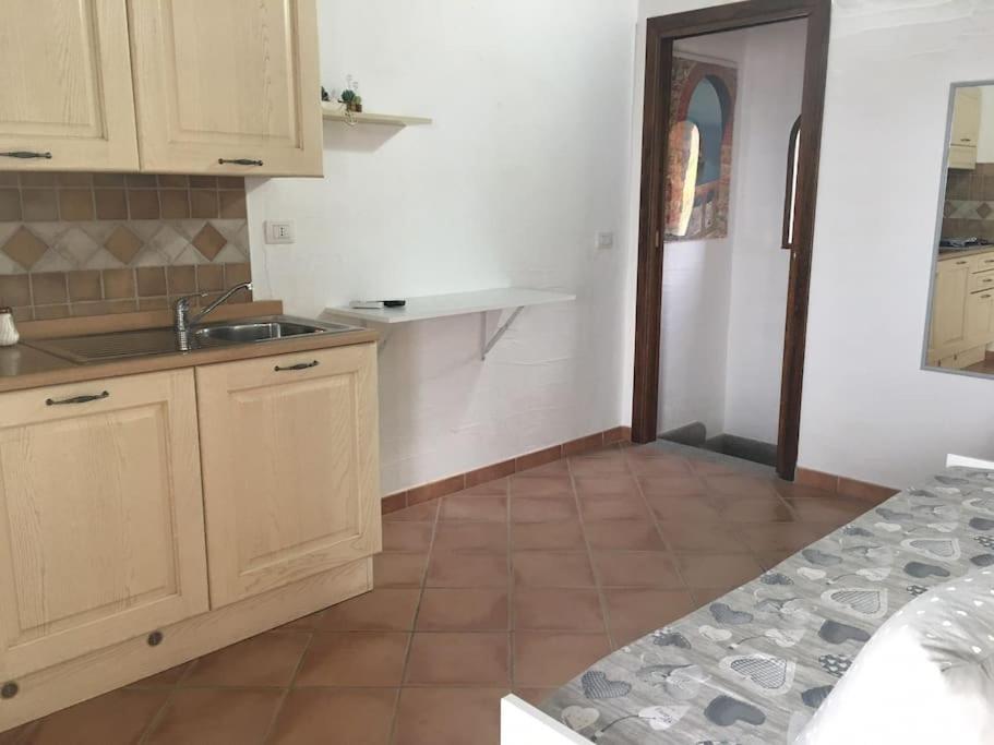 Kuchyň nebo kuchyňský kout v ubytování INCANTEVOLE TERRAZZA SUL MARE wifi e piscina
