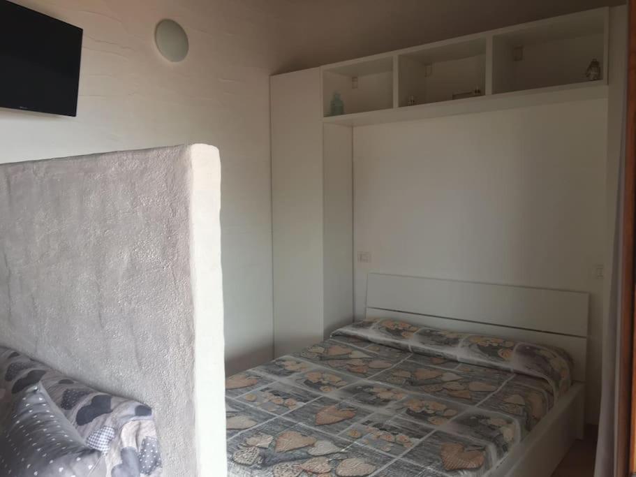 Postel nebo postele na pokoji v ubytování INCANTEVOLE TERRAZZA SUL MARE wifi e piscina