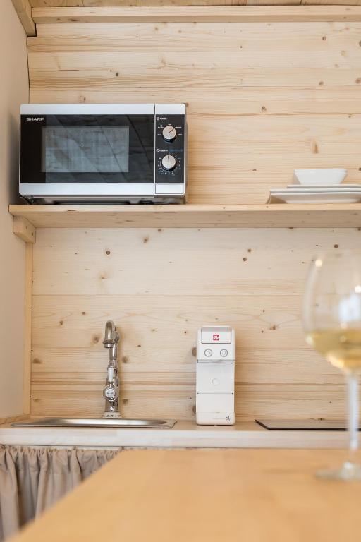 a microwave sitting on top of a kitchen counter at Park Residence in Split