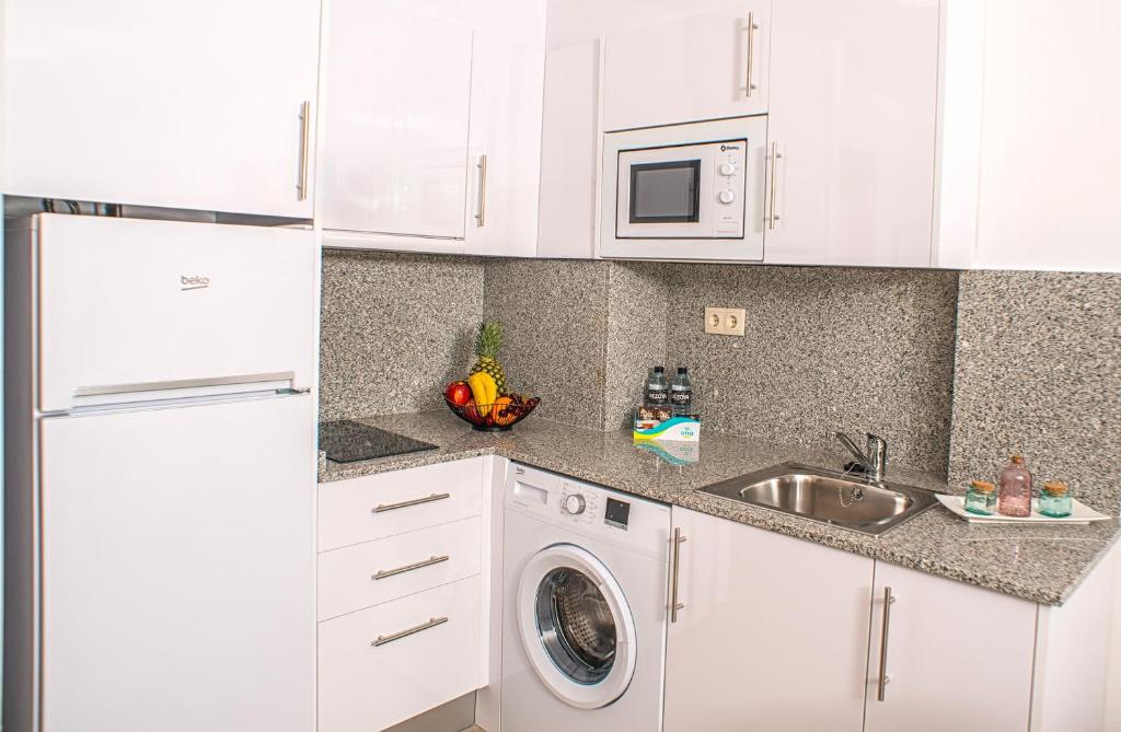 Kuchyňa alebo kuchynka v ubytovaní Ona Suites Salou