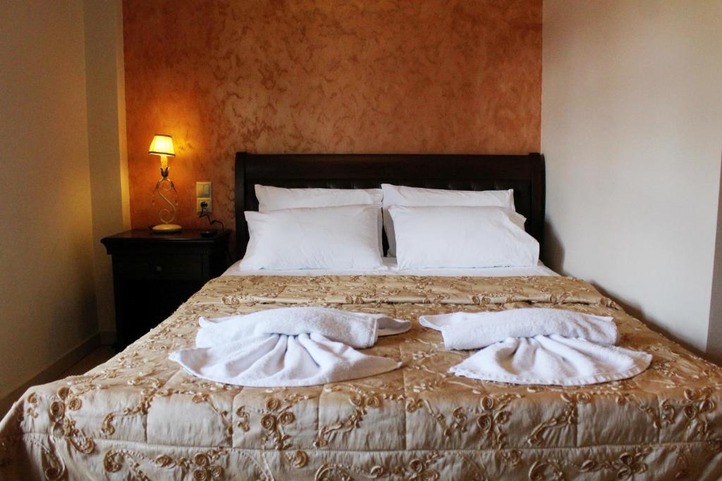 Posteľ alebo postele v izbe v ubytovaní Guesthouse Vavitsas