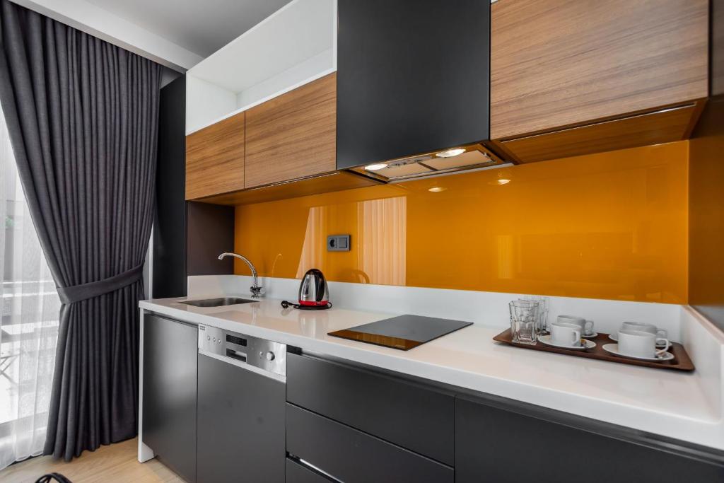 A kitchen or kitchenette at Nox Suite