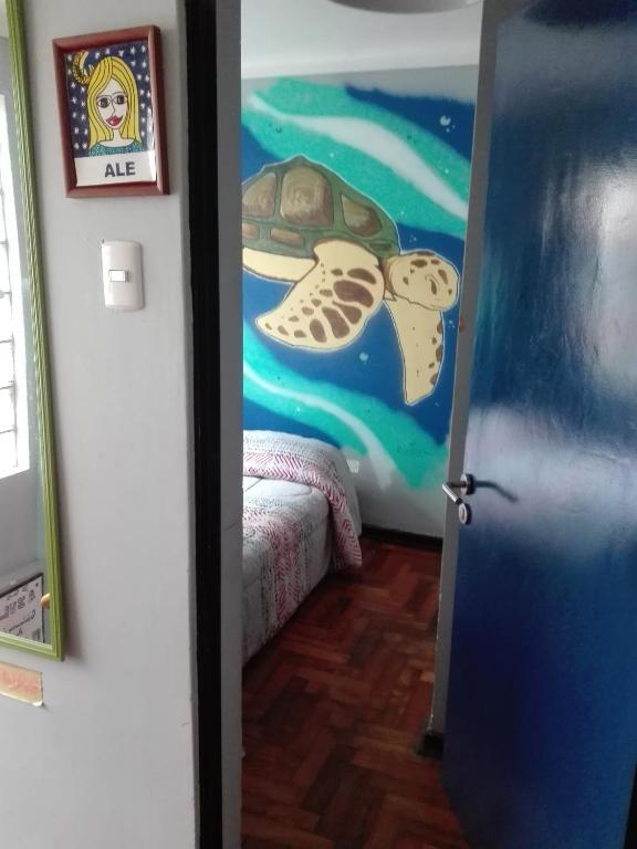 Postel nebo postele na pokoji v ubytování La Casa Azul Hostel