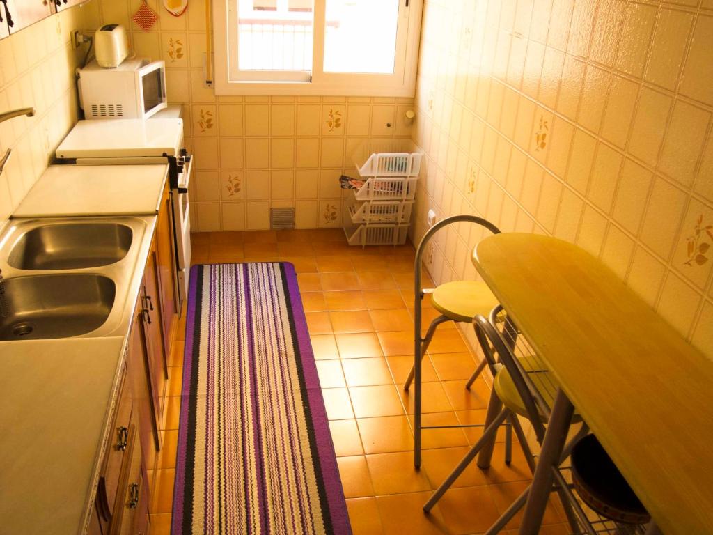Kuchyňa alebo kuchynka v ubytovaní CAL SAMARRA