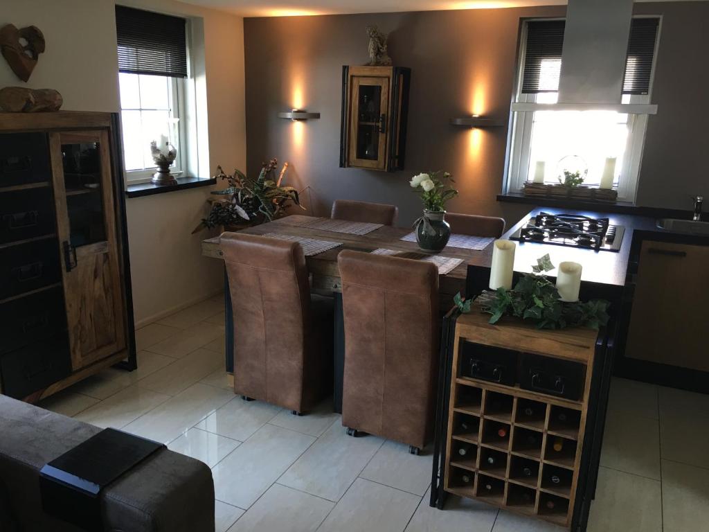 Kuchyň nebo kuchyňský kout v ubytování Beach bungalow Hellevoetsluis