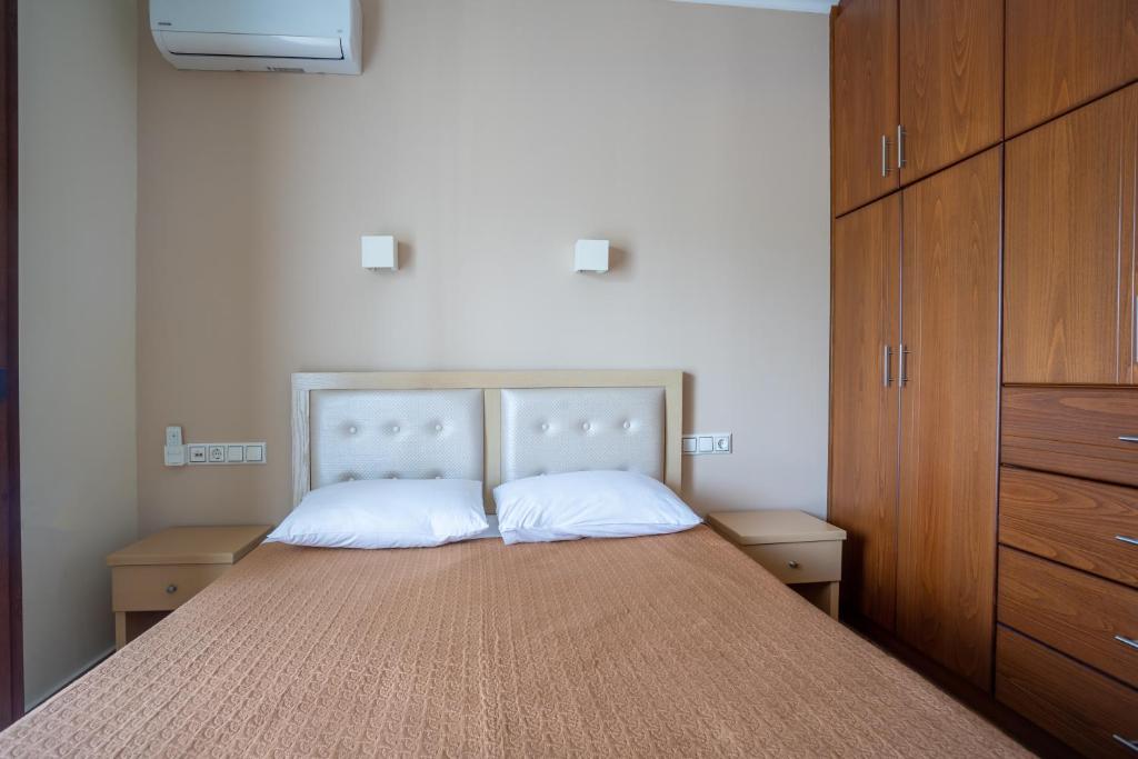 Postel nebo postele na pokoji v ubytování Kavadias Apartments