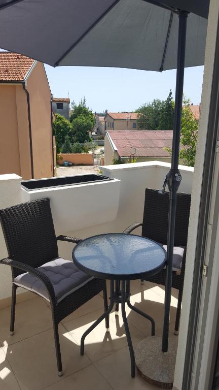 Ein Balkon oder eine Terrasse in der Unterkunft Villa Iva