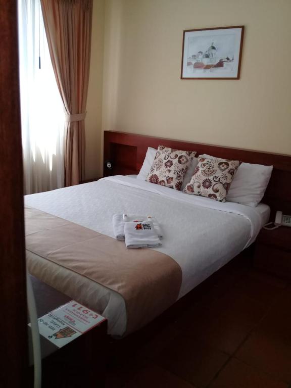 Postel nebo postele na pokoji v ubytování Hotel Casa Kolping Quito