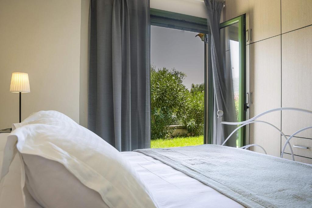 Postel nebo postele na pokoji v ubytování Sky Apartment