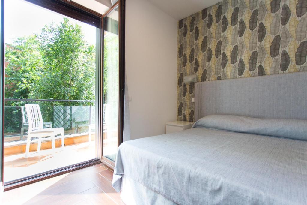 Postel nebo postele na pokoji v ubytování B&B Maria Rosaria