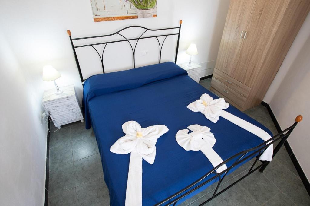 Postel nebo postele na pokoji v ubytování The 5 Terre