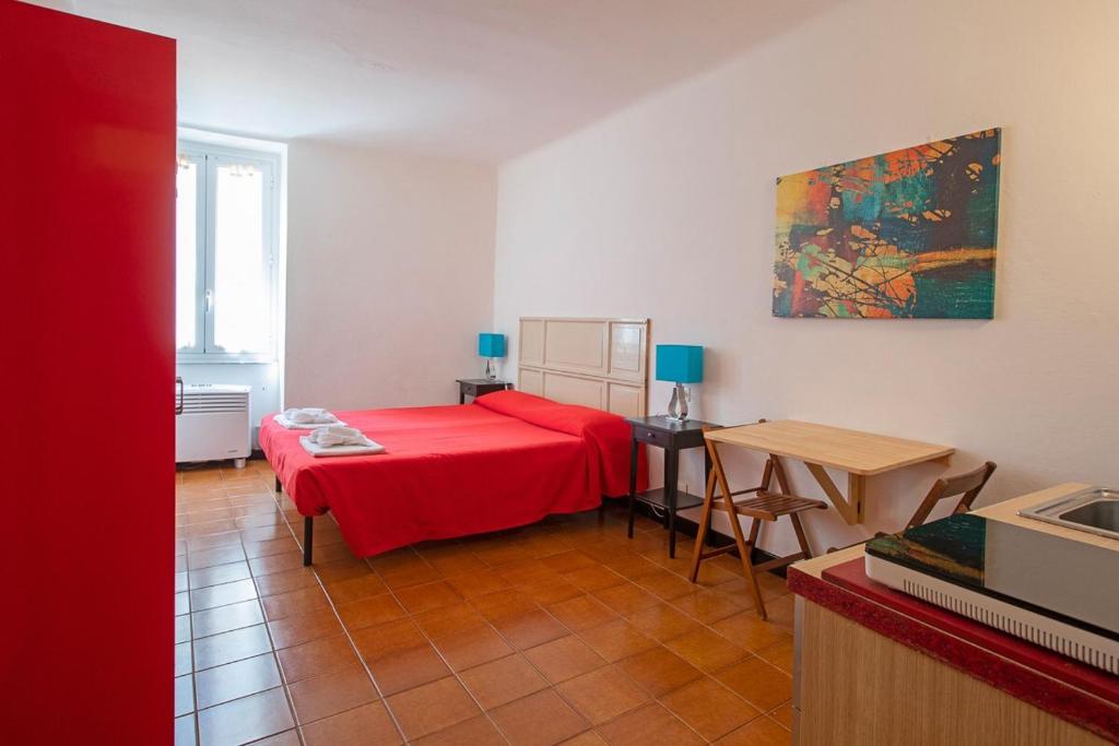 Postel nebo postele na pokoji v ubytování Affittacamere Il Centro