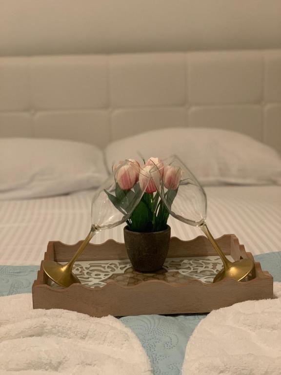 Postel nebo postele na pokoji v ubytování Apartments Dibra