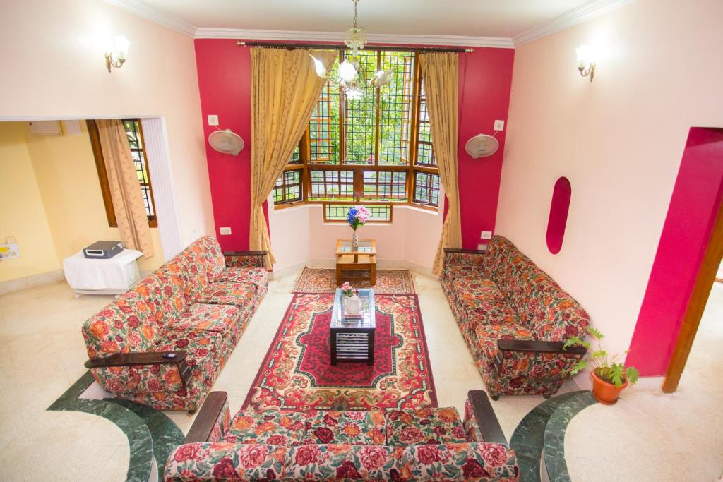 Posezení v ubytování LikeMyHome Homestay Mysore