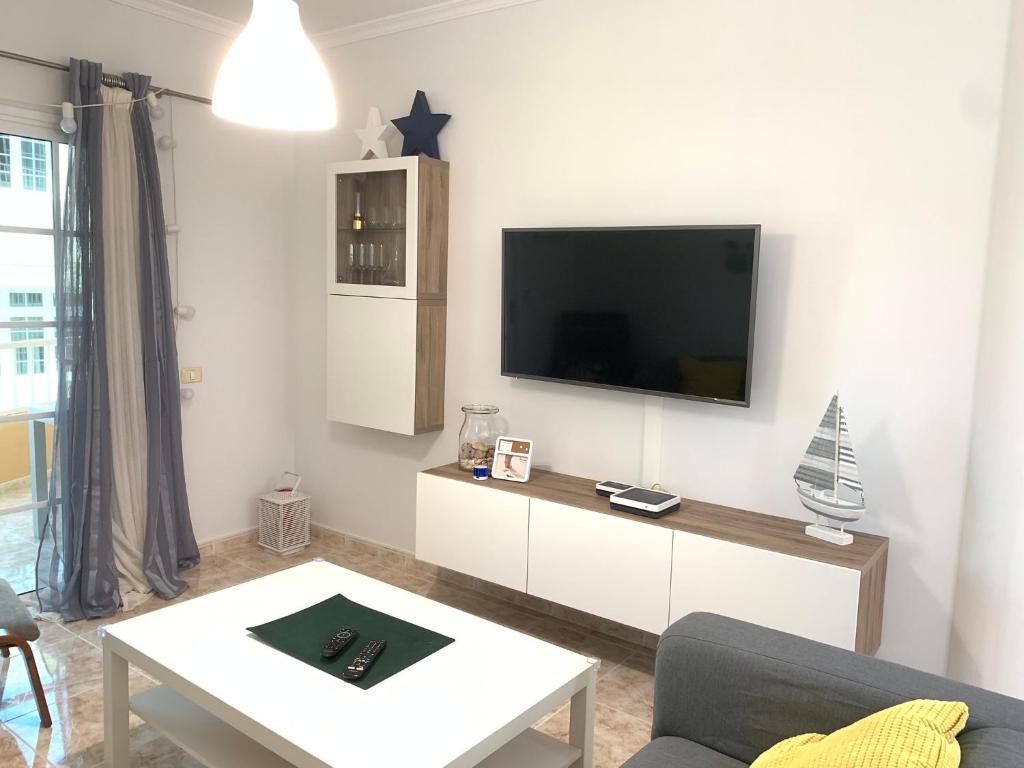 TV a/nebo společenská místnost v ubytování Travesía