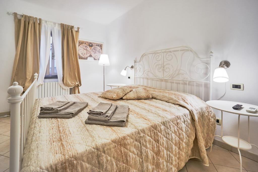 Postel nebo postele na pokoji v ubytování Casa Laurentius