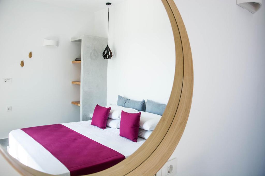 Postel nebo postele na pokoji v ubytování Dragonfly Villas