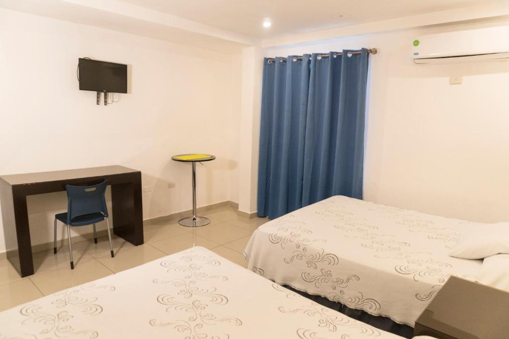 Voodi või voodid majutusasutuse Micro Hotel Rio de Piedras toas