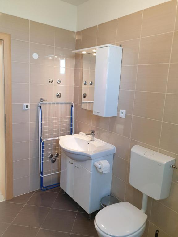 Koupelna v ubytování Apartments Jana