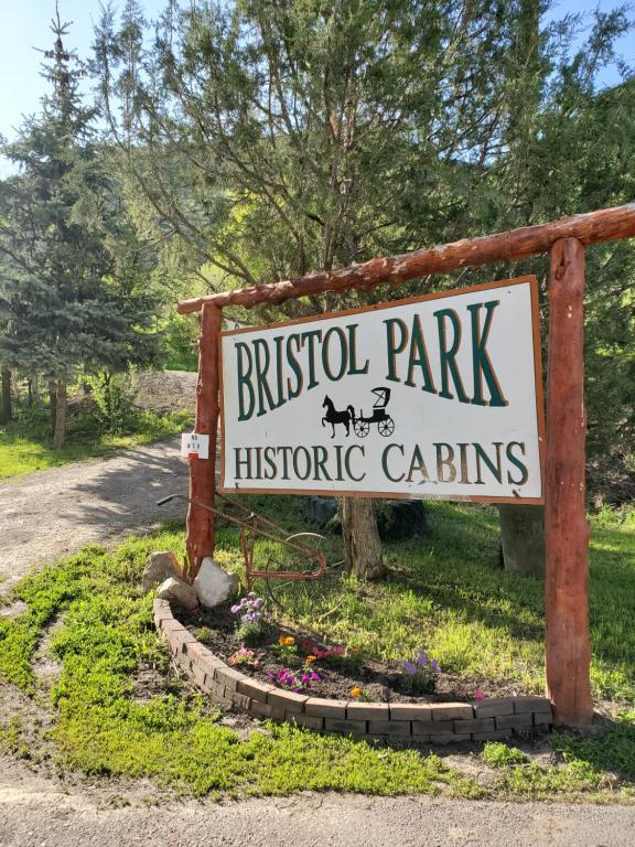 a sign for the british parkitschric gardens at Bristol Cabins in Lava Hot Springs