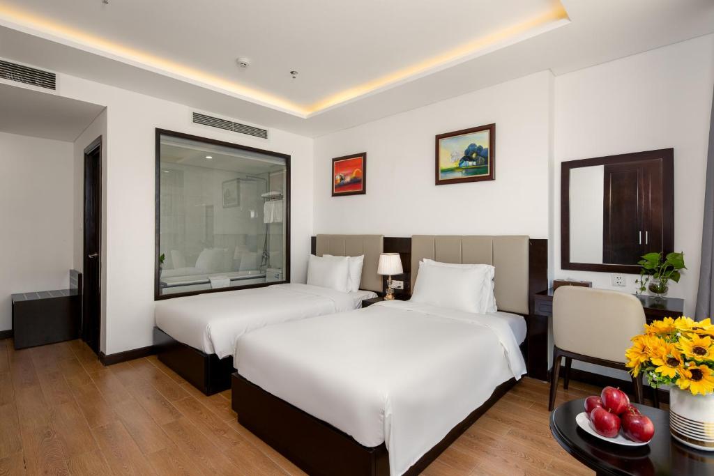 Phòng Deluxe 2 Giường Đơn Có Bồn Tắm Và Tầm Nhìn Ra Thành Phố